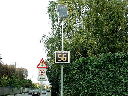 Radar speed reduction signs visible